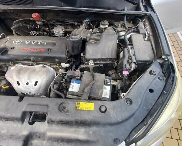 Серый Тойота РАВ 4, объемом двигателя 2.4 л и пробегом 282 тыс. км за 7900 $, фото 1 на Automoto.ua