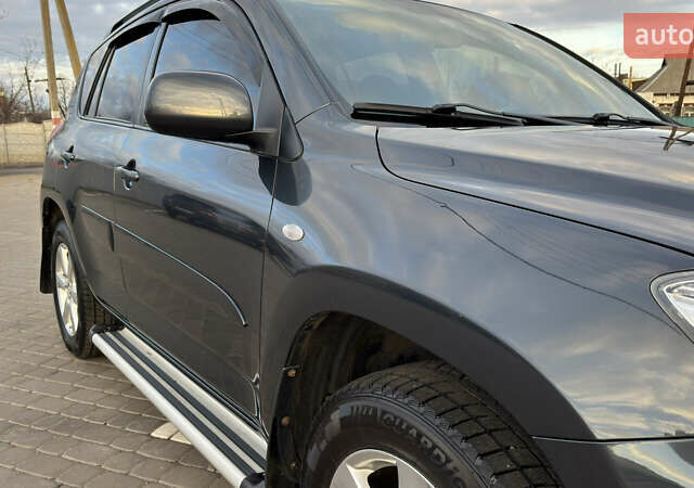 Серый Тойота РАВ 4, объемом двигателя 2 л и пробегом 90 тыс. км за 12300 $, фото 25 на Automoto.ua