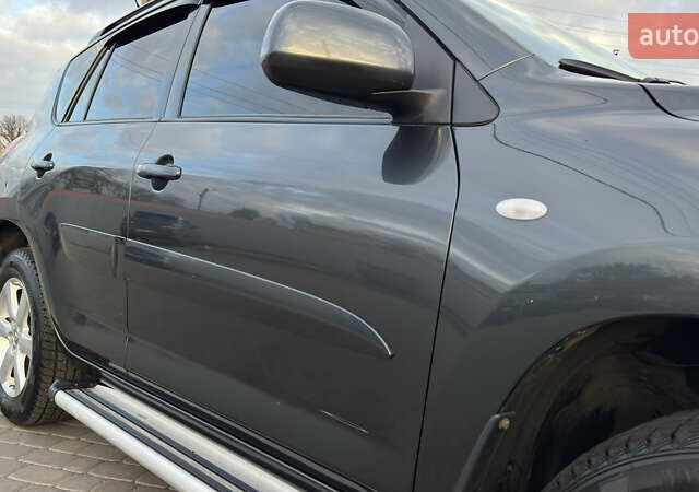 Сірий Тойота РАВ 4, об'ємом двигуна 2 л та пробігом 90 тис. км за 12300 $, фото 40 на Automoto.ua