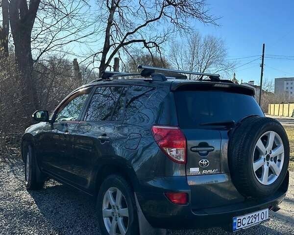 Серый Тойота РАВ 4, объемом двигателя 2 л и пробегом 240 тыс. км за 9800 $, фото 3 на Automoto.ua