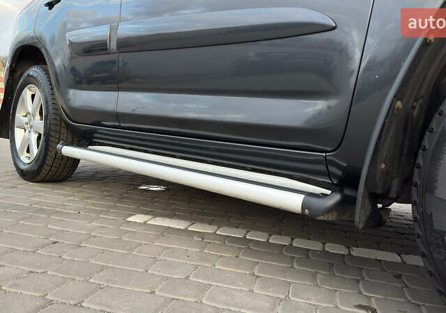 Сірий Тойота РАВ 4, об'ємом двигуна 2 л та пробігом 90 тис. км за 12300 $, фото 42 на Automoto.ua