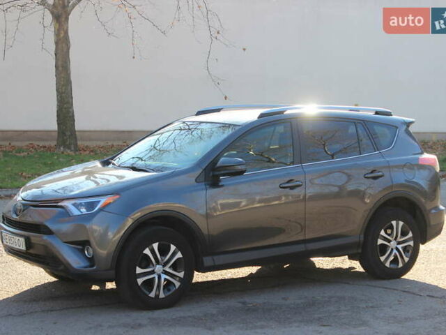 Серый Тойота РАВ 4, объемом двигателя 2.49 л и пробегом 170 тыс. км за 18600 $, фото 2 на Automoto.ua