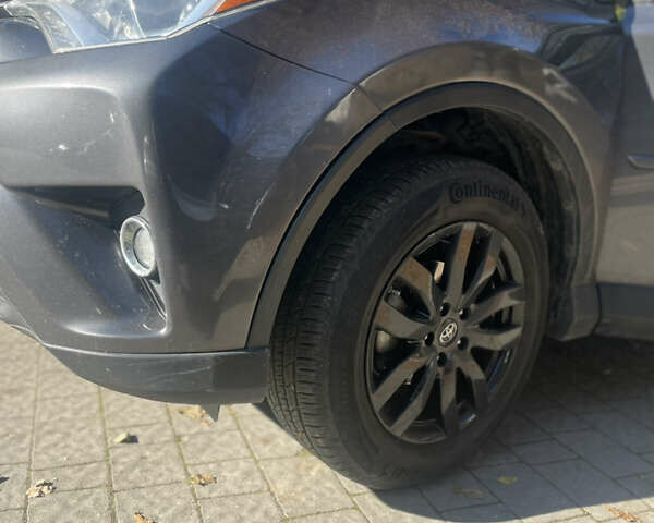 Серый Тойота РАВ 4, объемом двигателя 2.49 л и пробегом 112 тыс. км за 17000 $, фото 1 на Automoto.ua