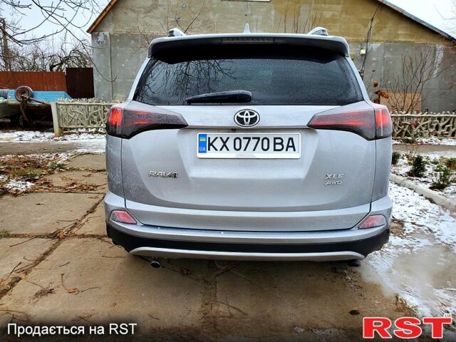 Сірий Тойота РАВ 4, об'ємом двигуна 2.5 л та пробігом 232 тис. км за 19500 $, фото 3 на Automoto.ua