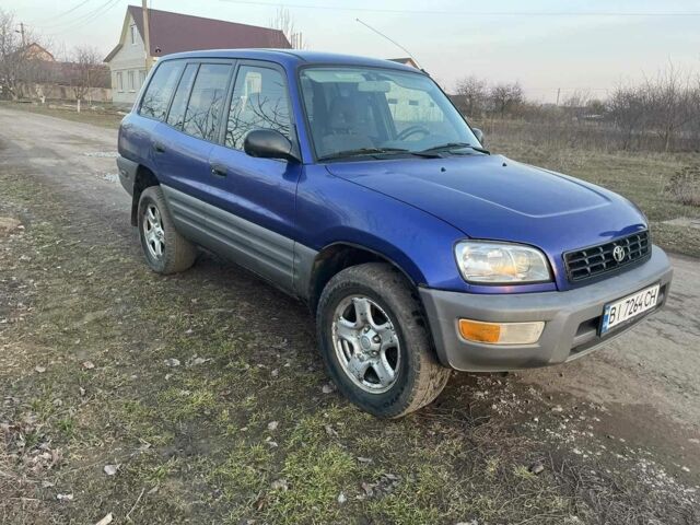 Синий Тойота РАВ 4, объемом двигателя 2 л и пробегом 330 тыс. км за 4800 $, фото 6 на Automoto.ua