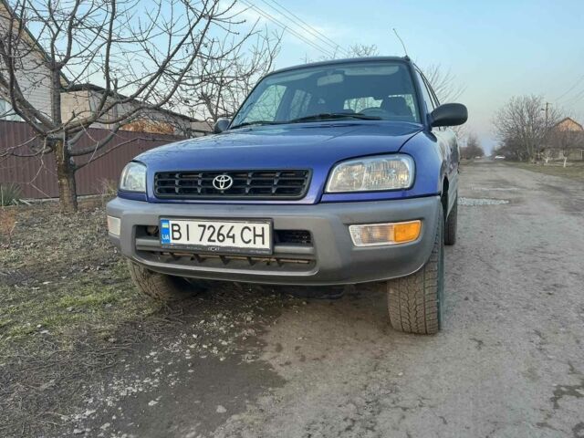 Синий Тойота РАВ 4, объемом двигателя 2 л и пробегом 330 тыс. км за 4800 $, фото 5 на Automoto.ua