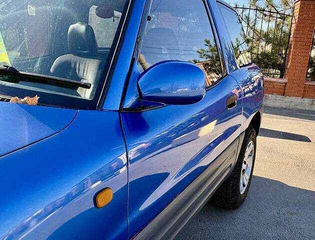 Синий Тойота РАВ 4, объемом двигателя 2 л и пробегом 437 тыс. км за 4999 $, фото 2 на Automoto.ua