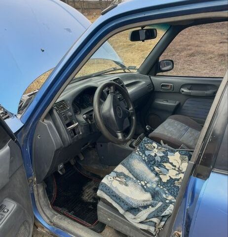 Синий Тойота РАВ 4, объемом двигателя 2 л и пробегом 420 тыс. км за 2600 $, фото 6 на Automoto.ua