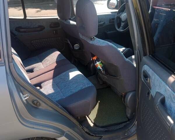 Синій Тойота РАВ 4, об'ємом двигуна 2 л та пробігом 163 тис. км за 6200 $, фото 4 на Automoto.ua