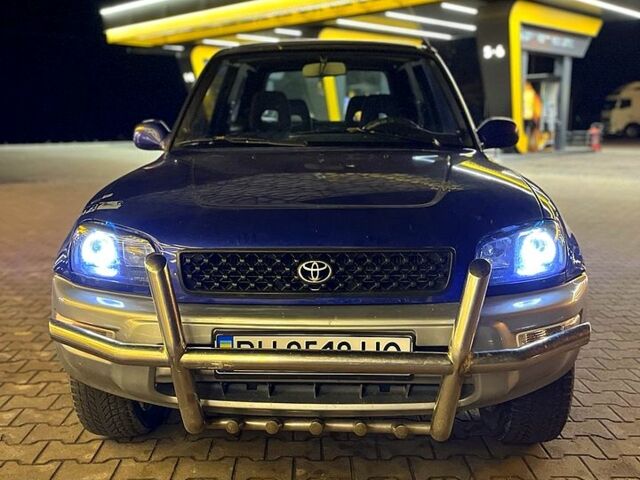 Синий Тойота РАВ 4, объемом двигателя 2 л и пробегом 419 тыс. км за 5500 $, фото 3 на Automoto.ua