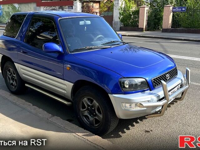 Синий Тойота РАВ 4, объемом двигателя 2 л и пробегом 419 тыс. км за 5500 $, фото 2 на Automoto.ua