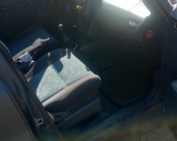 Синій Тойота РАВ 4, об'ємом двигуна 2 л та пробігом 163 тис. км за 6200 $, фото 2 на Automoto.ua