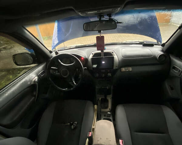 Синій Тойота РАВ 4, об'ємом двигуна 2 л та пробігом 244 тис. км за 6800 $, фото 36 на Automoto.ua