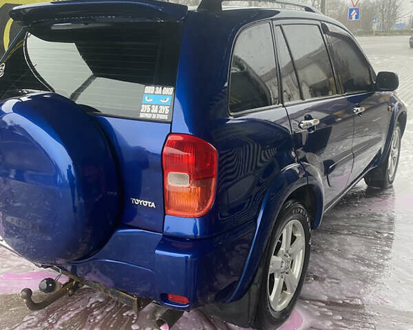 Синій Тойота РАВ 4, об'ємом двигуна 2 л та пробігом 244 тис. км за 6800 $, фото 10 на Automoto.ua