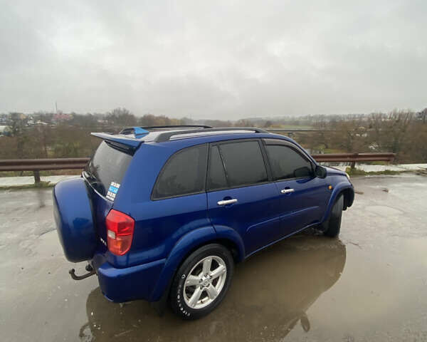 Синій Тойота РАВ 4, об'ємом двигуна 2 л та пробігом 244 тис. км за 6800 $, фото 17 на Automoto.ua