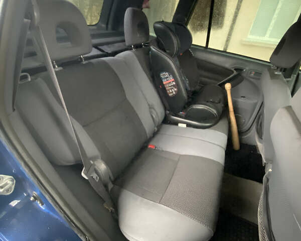 Синій Тойота РАВ 4, об'ємом двигуна 2 л та пробігом 244 тис. км за 6800 $, фото 37 на Automoto.ua