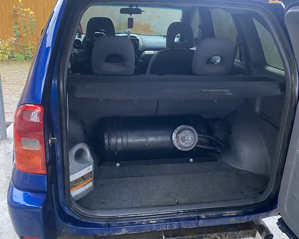 Синій Тойота РАВ 4, об'ємом двигуна 2 л та пробігом 244 тис. км за 6800 $, фото 35 на Automoto.ua