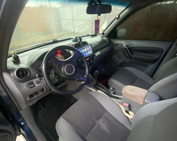 Синій Тойота РАВ 4, об'ємом двигуна 2 л та пробігом 244 тис. км за 6800 $, фото 25 на Automoto.ua