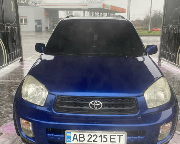 Синій Тойота РАВ 4, об'ємом двигуна 2 л та пробігом 244 тис. км за 6800 $, фото 1 на Automoto.ua