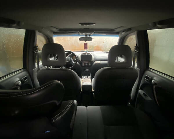 Синій Тойота РАВ 4, об'ємом двигуна 2 л та пробігом 244 тис. км за 6800 $, фото 40 на Automoto.ua