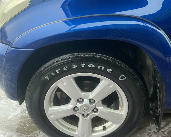 Синій Тойота РАВ 4, об'ємом двигуна 2 л та пробігом 244 тис. км за 6800 $, фото 4 на Automoto.ua