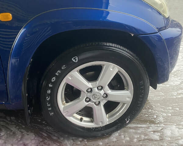 Синій Тойота РАВ 4, об'ємом двигуна 2 л та пробігом 244 тис. км за 6800 $, фото 12 на Automoto.ua