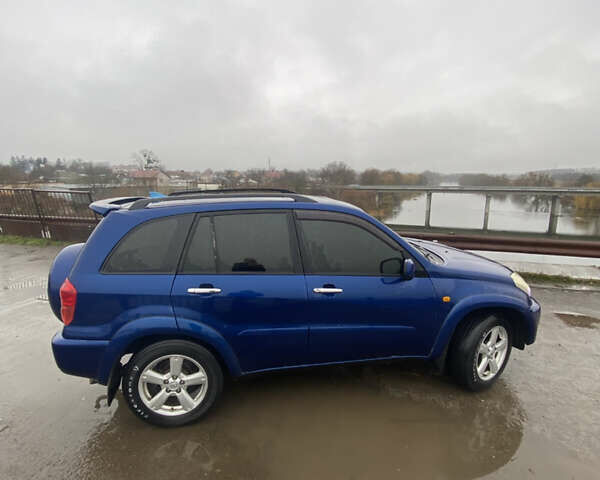 Синій Тойота РАВ 4, об'ємом двигуна 2 л та пробігом 244 тис. км за 6800 $, фото 18 на Automoto.ua