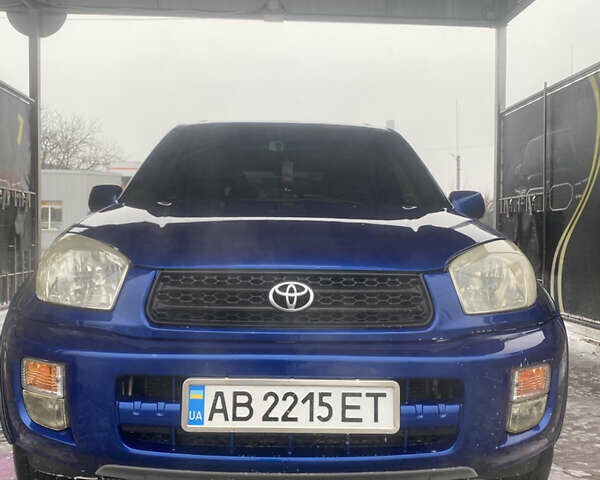 Синій Тойота РАВ 4, об'ємом двигуна 2 л та пробігом 244 тис. км за 6800 $, фото 2 на Automoto.ua