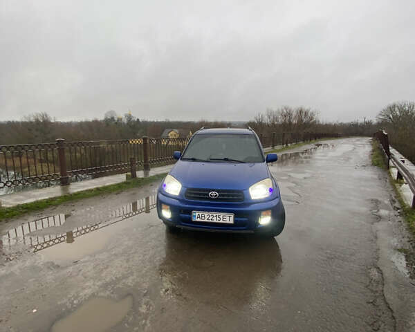 Синій Тойота РАВ 4, об'ємом двигуна 2 л та пробігом 244 тис. км за 6800 $, фото 19 на Automoto.ua