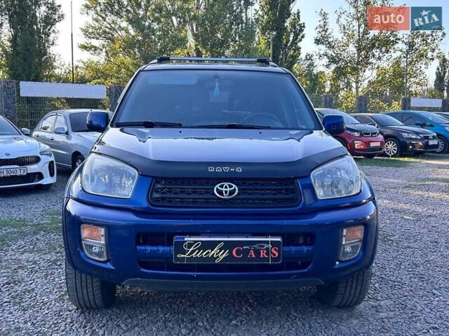 Синий Тойота РАВ 4, объемом двигателя 2 л и пробегом 238 тыс. км за 7000 $, фото 1 на Automoto.ua