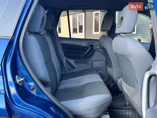 Синий Тойота РАВ 4, объемом двигателя 2 л и пробегом 238 тыс. км за 7000 $, фото 28 на Automoto.ua