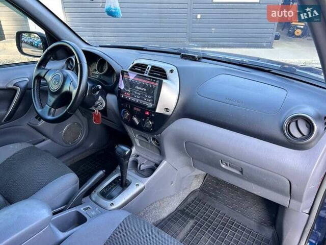 Синий Тойота РАВ 4, объемом двигателя 2 л и пробегом 238 тыс. км за 7000 $, фото 32 на Automoto.ua