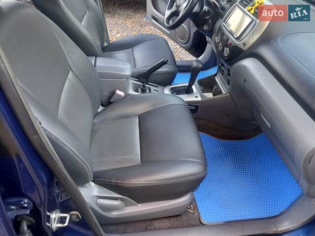 Синий Тойота РАВ 4, объемом двигателя 2 л и пробегом 330 тыс. км за 6499 $, фото 14 на Automoto.ua