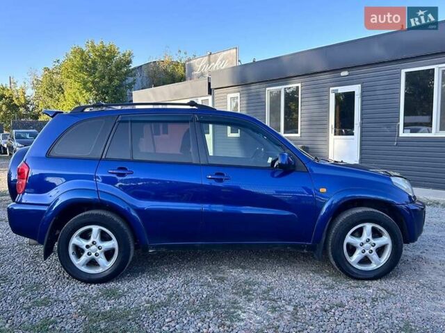 Синий Тойота РАВ 4, объемом двигателя 2 л и пробегом 238 тыс. км за 7000 $, фото 3 на Automoto.ua