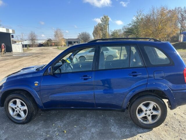 Синий Тойота РАВ 4, объемом двигателя 2 л и пробегом 2 тыс. км за 3600 $, фото 4 на Automoto.ua