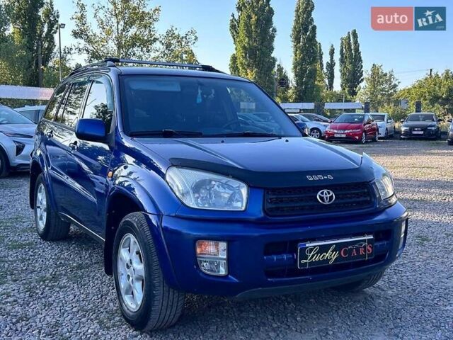 Синий Тойота РАВ 4, объемом двигателя 2 л и пробегом 238 тыс. км за 7000 $, фото 2 на Automoto.ua