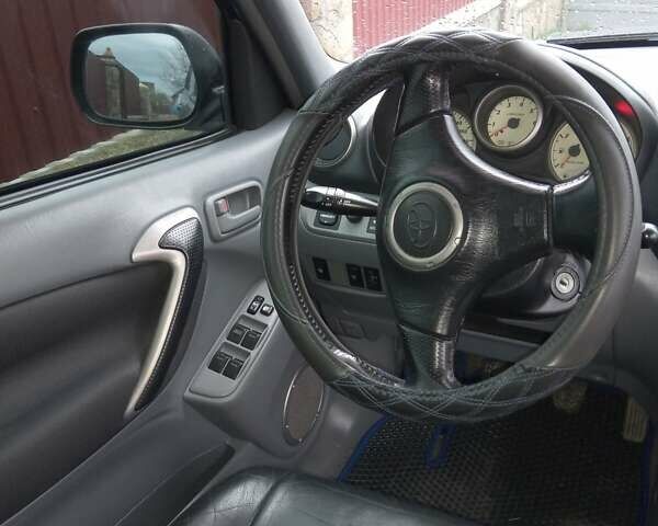 Синий Тойота РАВ 4, объемом двигателя 2 л и пробегом 290 тыс. км за 6500 $, фото 12 на Automoto.ua