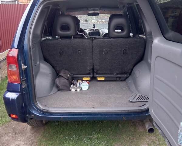 Синий Тойота РАВ 4, объемом двигателя 2 л и пробегом 290 тыс. км за 6500 $, фото 4 на Automoto.ua