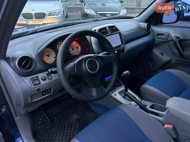 Синий Тойота РАВ 4, объемом двигателя 2 л и пробегом 242 тыс. км за 6700 $, фото 18 на Automoto.ua