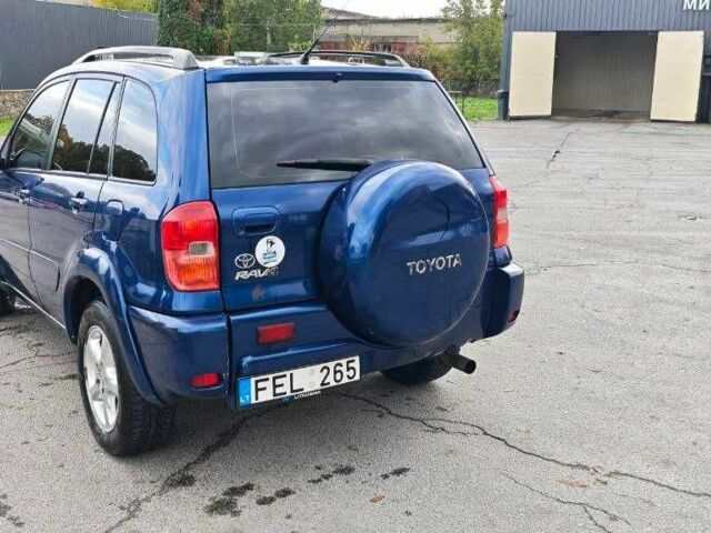Синий Тойота РАВ 4, объемом двигателя 2 л и пробегом 280 тыс. км за 3700 $, фото 1 на Automoto.ua