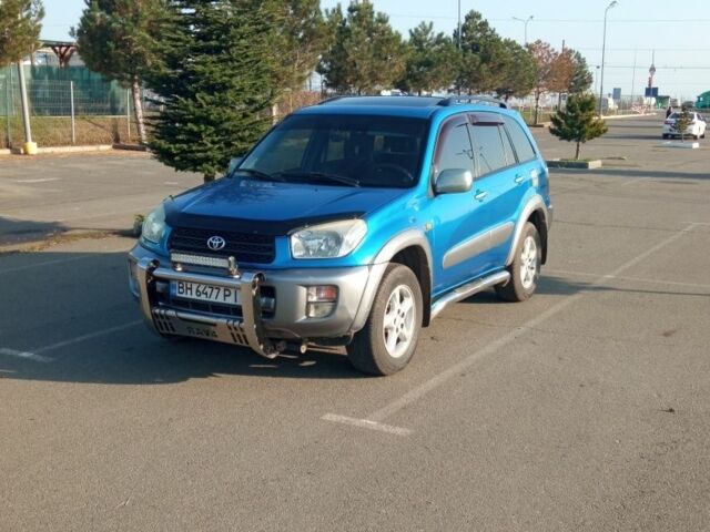 Синий Тойота РАВ 4, объемом двигателя 2 л и пробегом 226 тыс. км за 7800 $, фото 1 на Automoto.ua