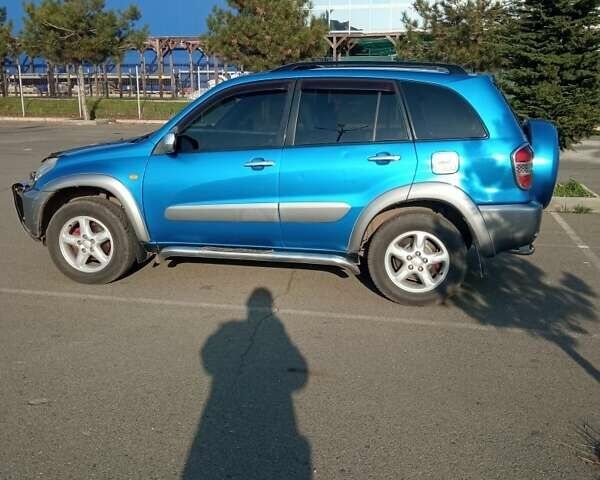 Синий Тойота РАВ 4, объемом двигателя 2 л и пробегом 226 тыс. км за 7800 $, фото 4 на Automoto.ua