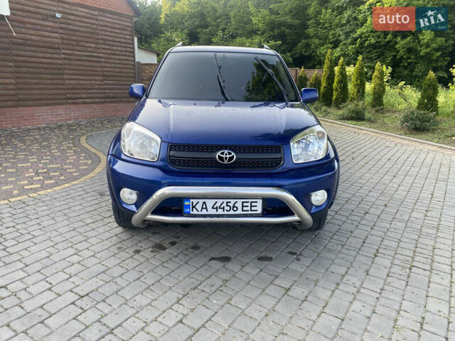 Синій Тойота РАВ 4, об'ємом двигуна 2 л та пробігом 235 тис. км за 6900 $, фото 7 на Automoto.ua