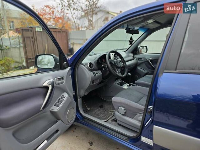 Синій Тойота РАВ 4, об'ємом двигуна 2 л та пробігом 135 тис. км за 6700 $, фото 20 на Automoto.ua