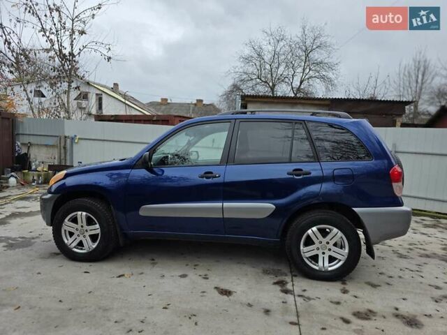 Синій Тойота РАВ 4, об'ємом двигуна 2 л та пробігом 135 тис. км за 5800 $, фото 24 на Automoto.ua
