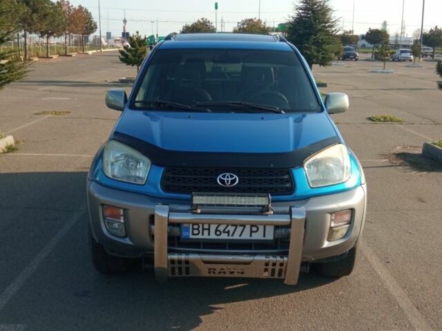 Синий Тойота РАВ 4, объемом двигателя 2 л и пробегом 226 тыс. км за 7800 $, фото 3 на Automoto.ua