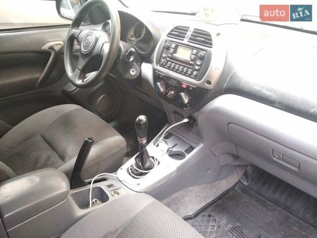 Синий Тойота РАВ 4, объемом двигателя 2 л и пробегом 323 тыс. км за 4999 $, фото 3 на Automoto.ua