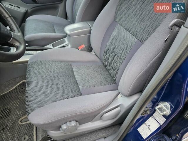 Синий Тойота РАВ 4, объемом двигателя 2 л и пробегом 134 тыс. км за 5900 $, фото 4 на Automoto.ua