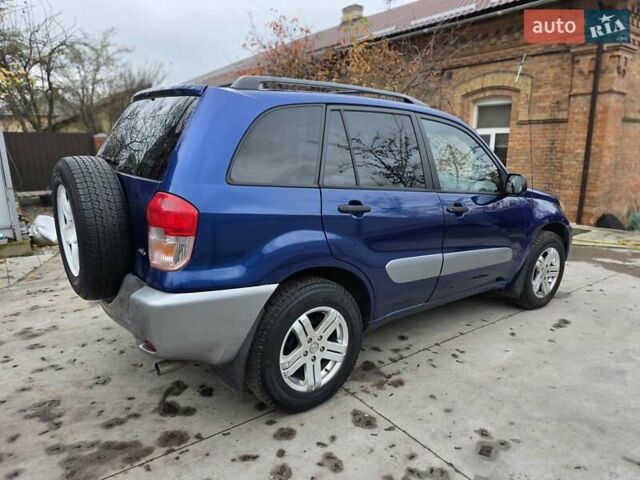 Синий Тойота РАВ 4, объемом двигателя 2 л и пробегом 135 тыс. км за 5900 $, фото 30 на Automoto.ua