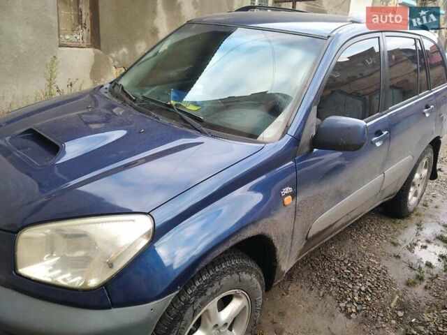 Синий Тойота РАВ 4, объемом двигателя 2 л и пробегом 323 тыс. км за 4999 $, фото 1 на Automoto.ua
